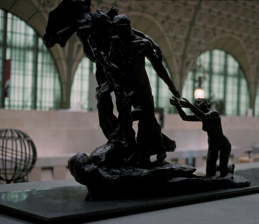 Statue of the angel of death carrying away a man