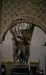 Statue of (slave) women holding up a globe